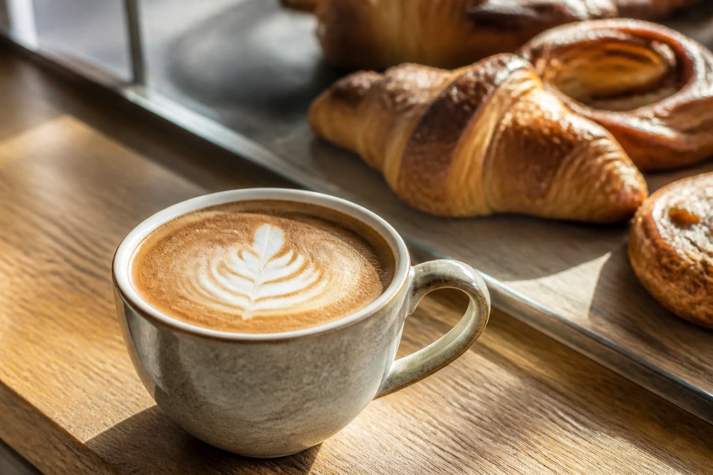 Barista pouring latte art